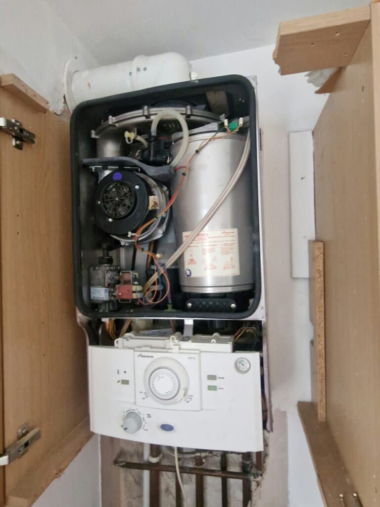 Several worn and damaged components removed during the repair.